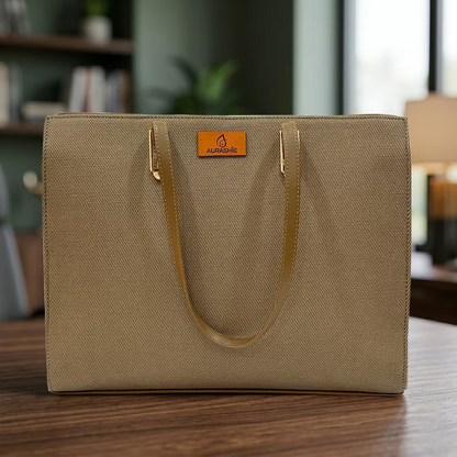 Beige tote bag with a brand logo on a wooden surface
