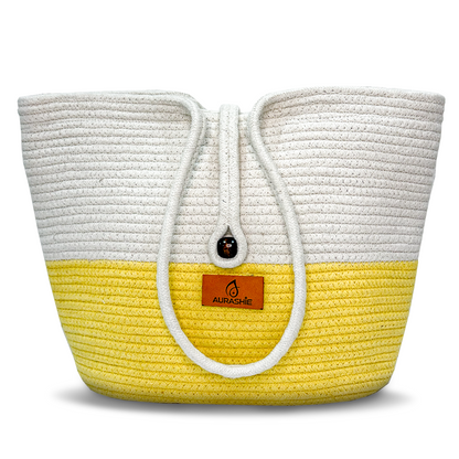 Yellow and white woven tote bag with a visible brand logo on a white background