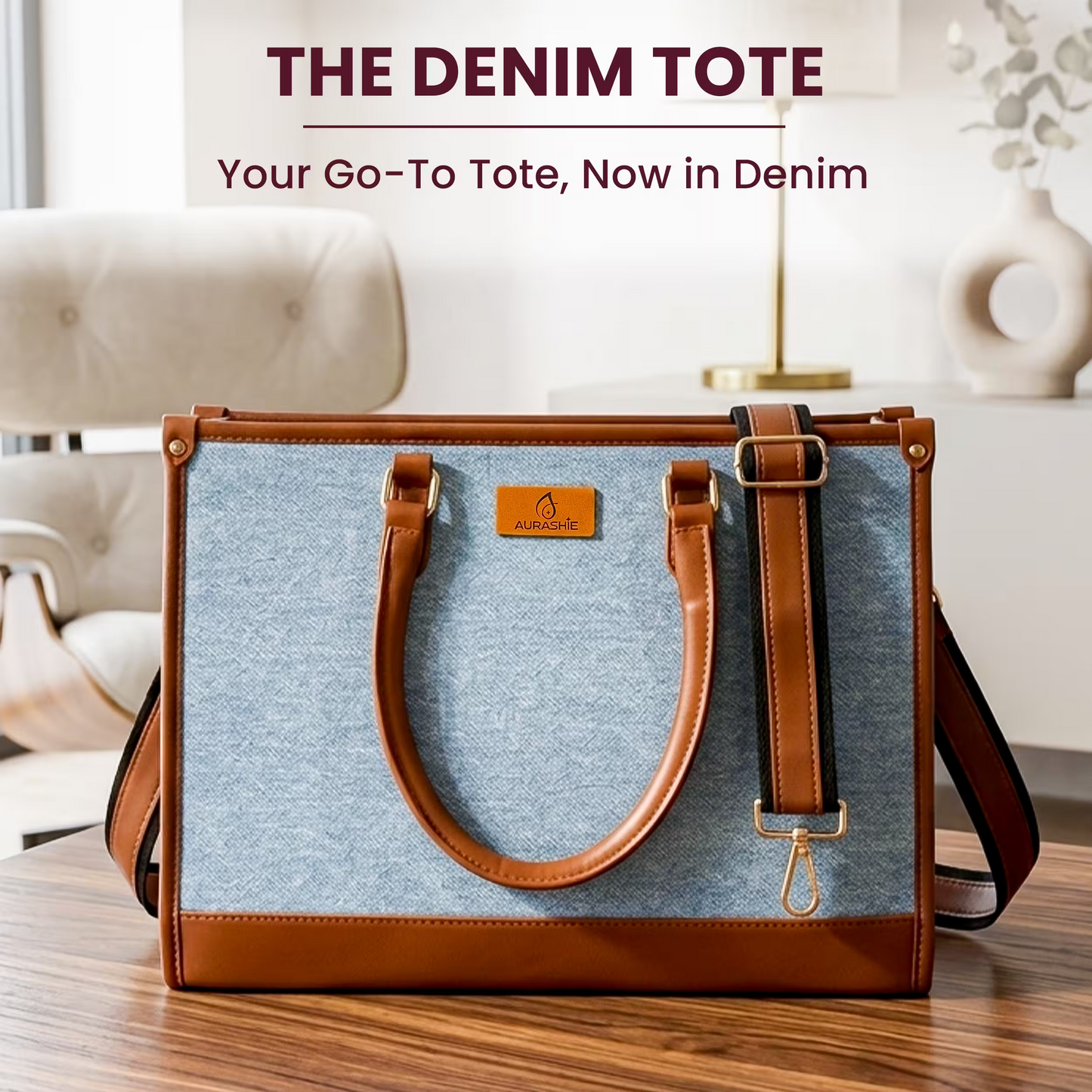 Denim tote bag with brown handles and trim on a wooden surface, with text 'The Denim Tote' and 'Your Go-To Tote, Now in Denim'.