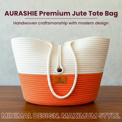 AURASHIE Premium Jute Tote Bag with white top and orange bottom on a wooden surface.