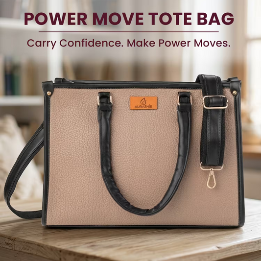 Beige tote bag with black handles and strap on a wooden surface, with 'Power Move Tote Bag' text above.