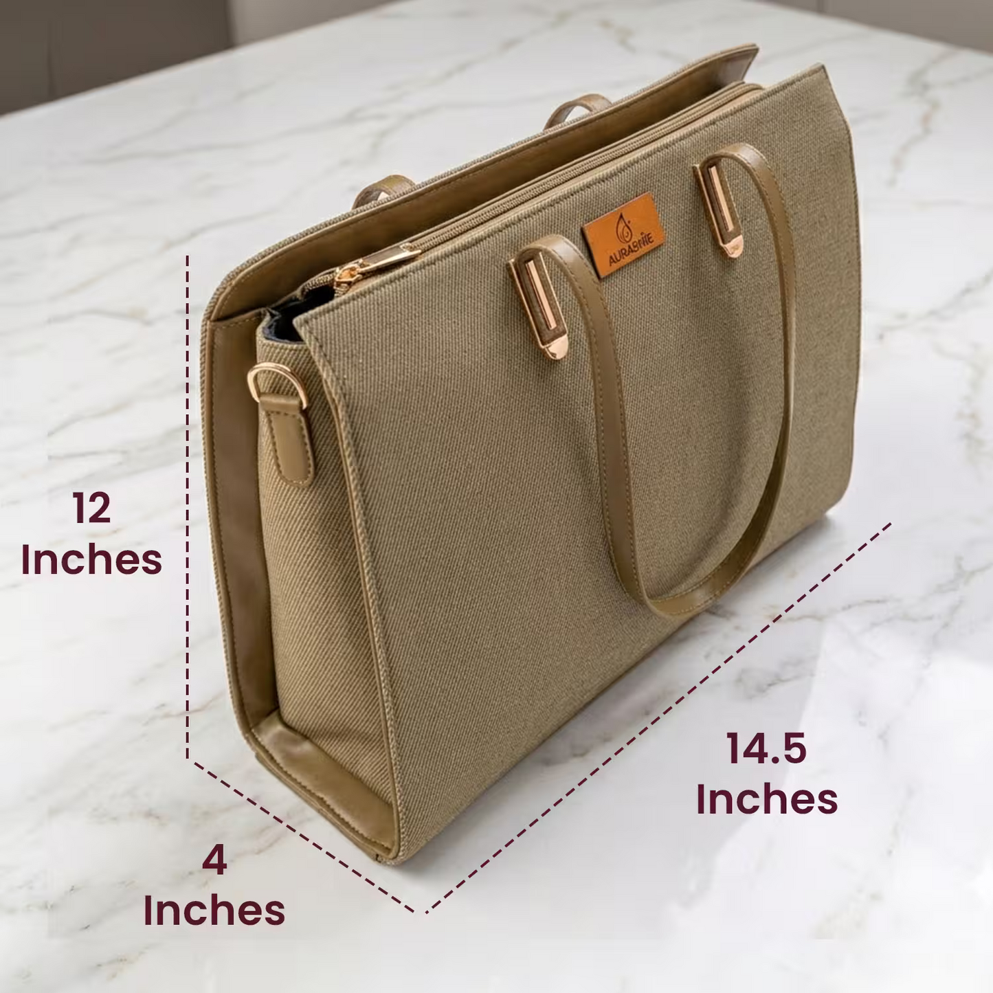 Beige handbag with dimensions labeled on a marble surface