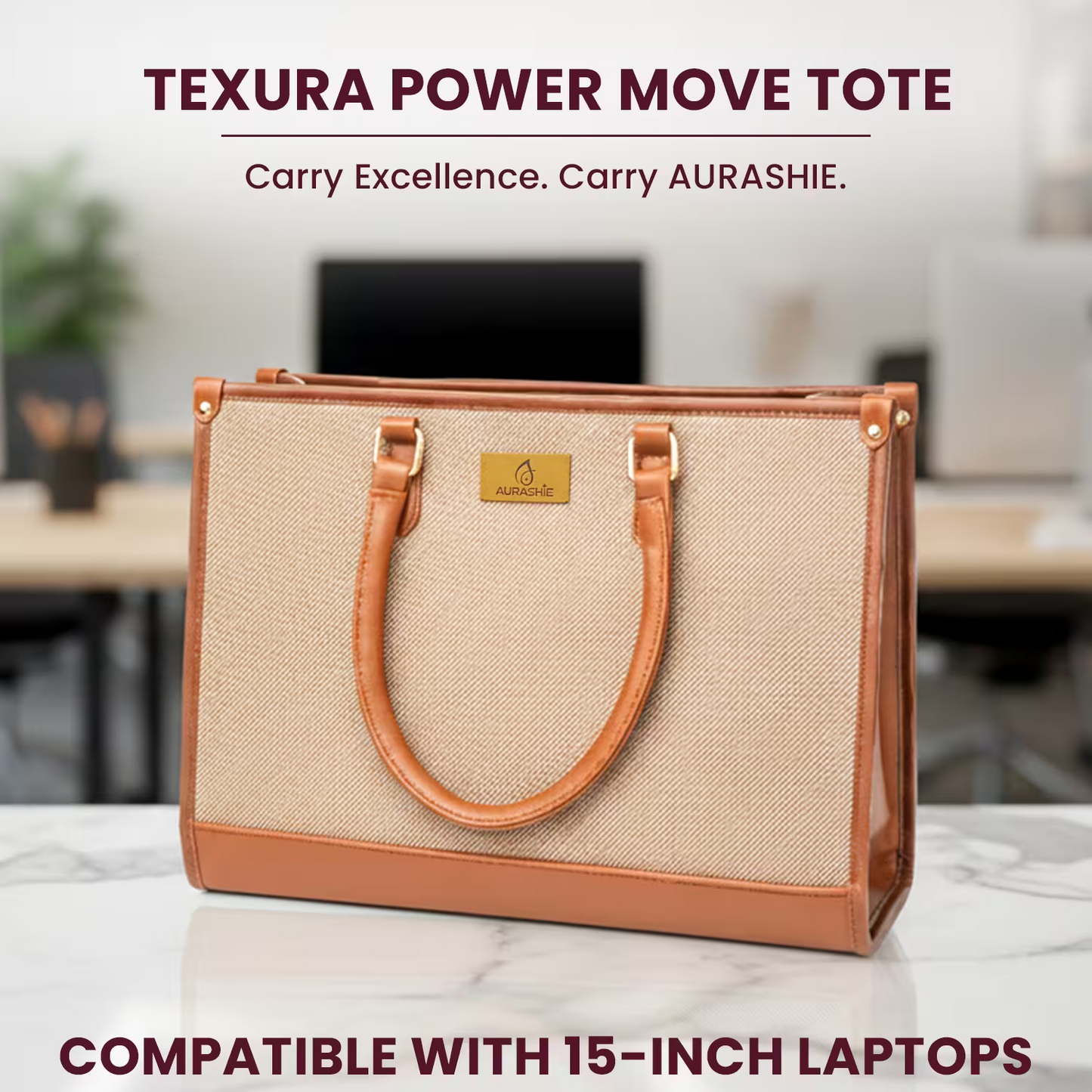 Beige and brown laptop tote bag with 'AURASHIE' brand on a blurred office background