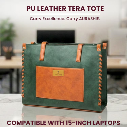 Green and brown PU leather tote bag with 'AURASHIE' branding on a blurred office background.