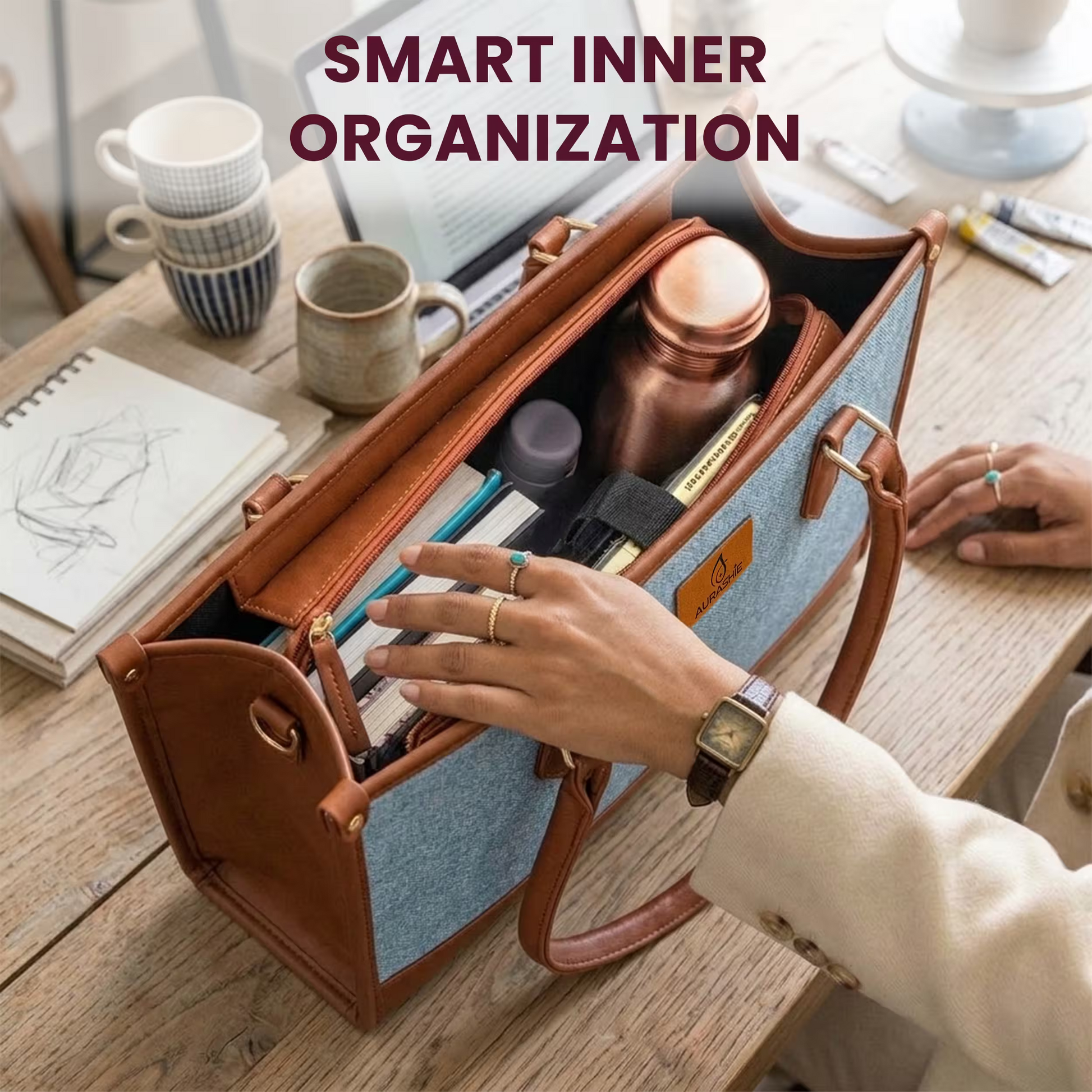 Handbag with organized items on a desk, text 'Smart Inner Organization' above.