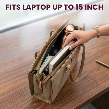 Beige laptop bag with a hand reaching inside on a wooden surface, text indicating laptop size compatibility.