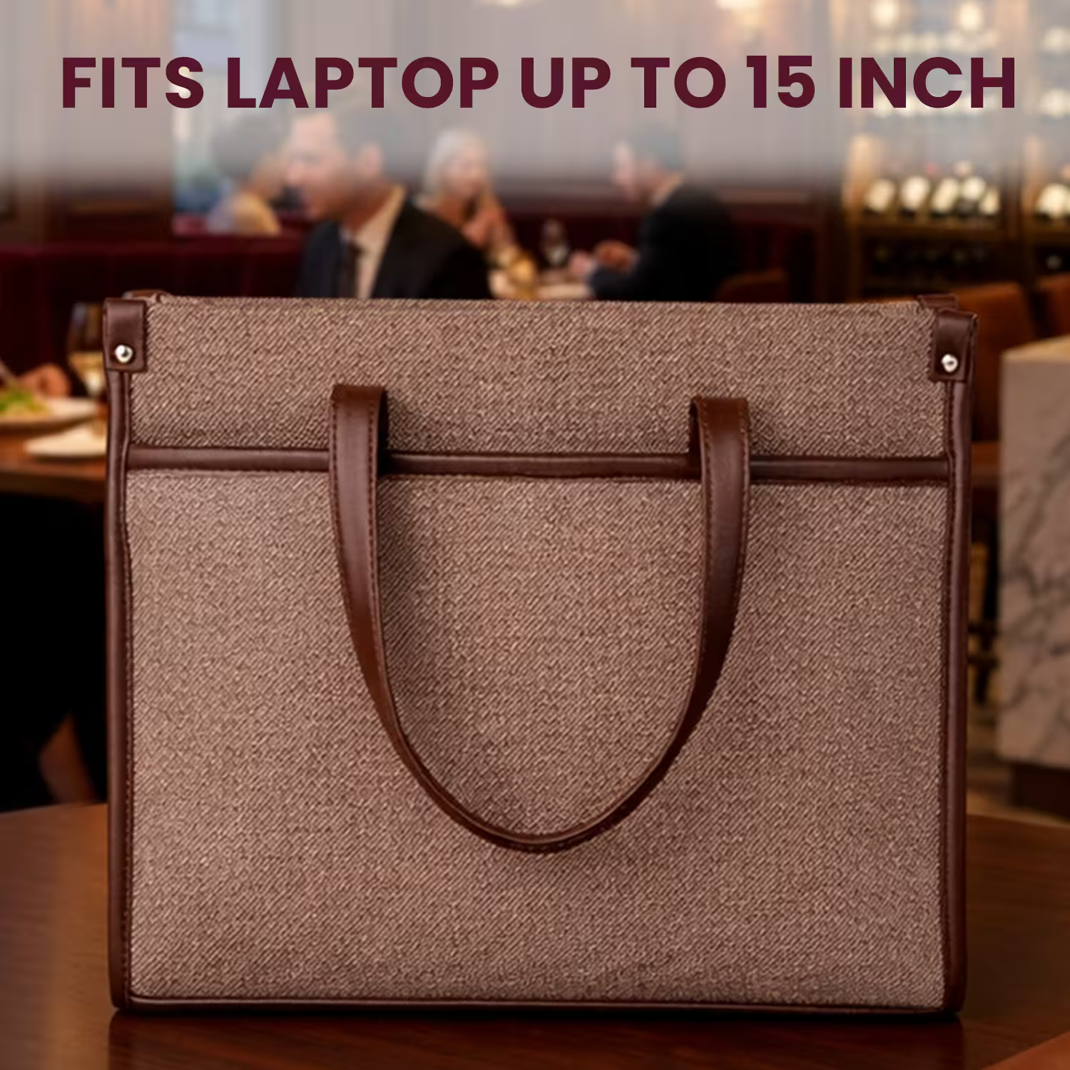 Brown laptop bag with brown handles on a blurred restaurant background