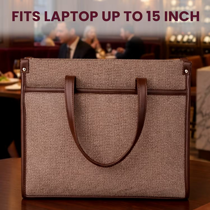 Brown laptop bag with brown handles on a blurred restaurant background