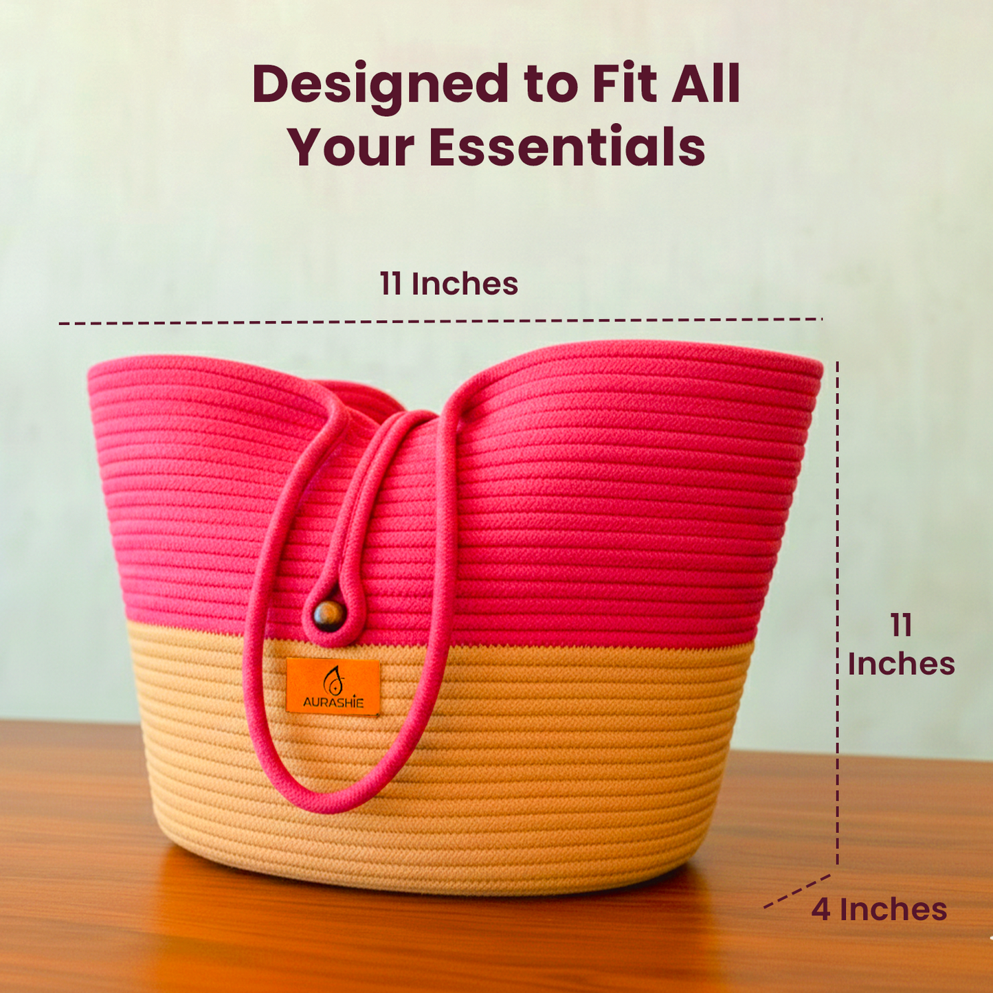 Pink and beige woven bag with dimensions on a wooden surface